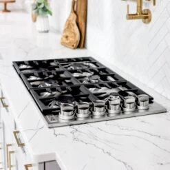 ZLINE 36" Dropin Gas Stovetop With 6 Gas Burners (RC36) 14 ZLINE 36" Dropin Gas Stovetop With 6 Gas Burners (RC36) -Home And Outdoor zline professional gas dropin cooktop RC36 kitchen lifestyle 20cd28cd c615 4569 aa86 7f7b9c0af1f8